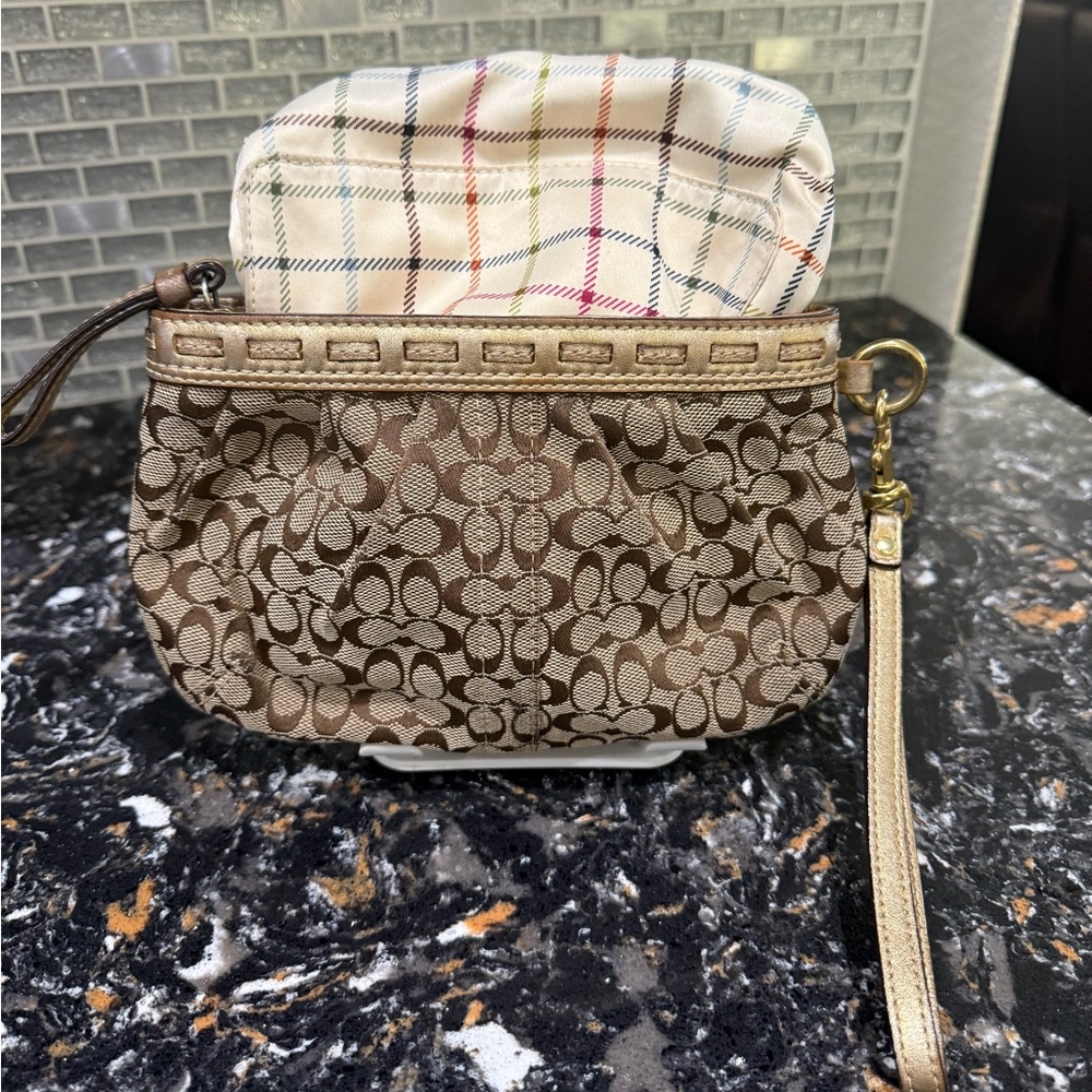 Coach Brown Signature Wristlet with Gold Trim and tattersall lining